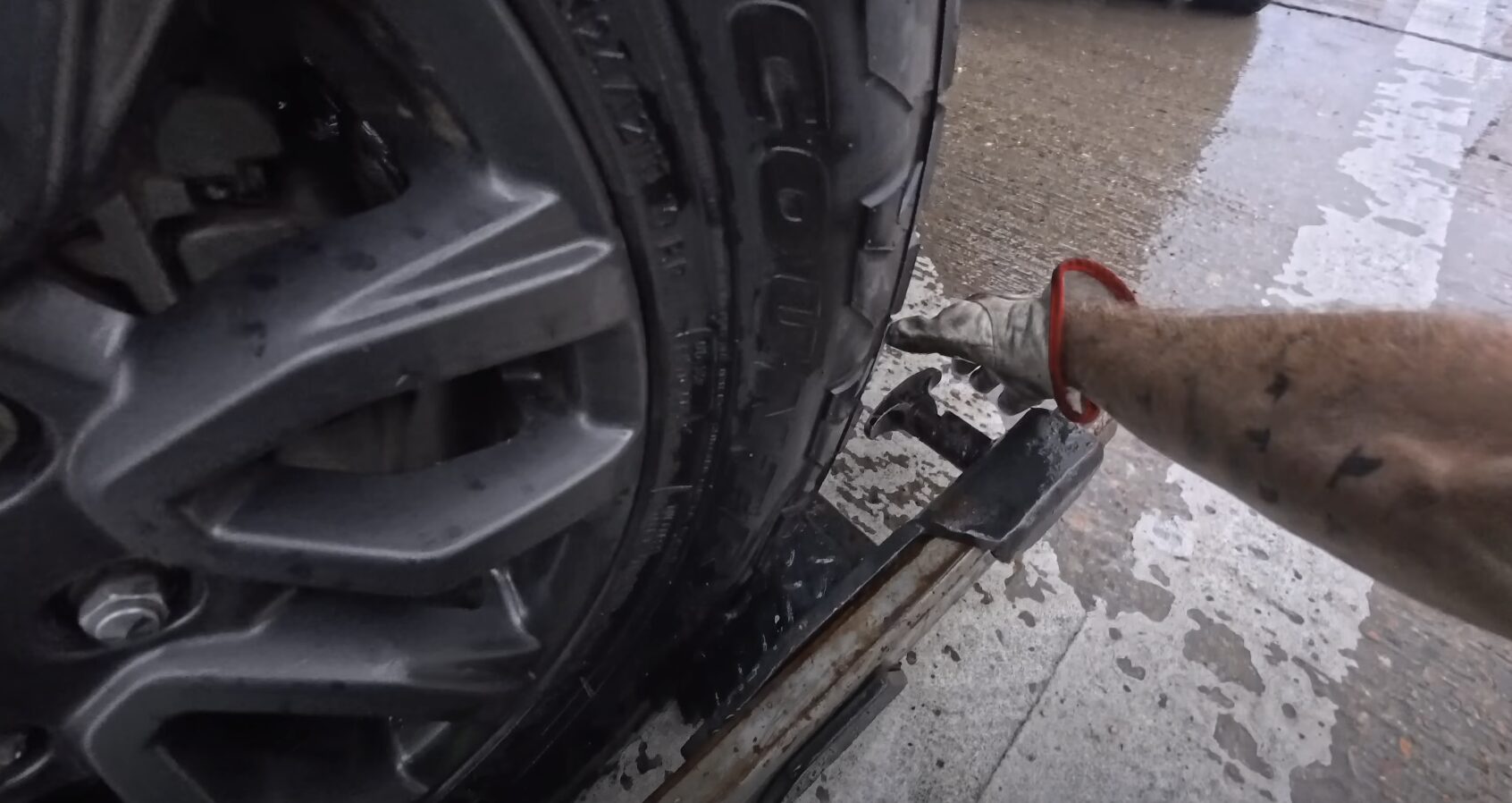 Close-up of heavy-duty towing equipment showing professional securing and lifting mechanisms