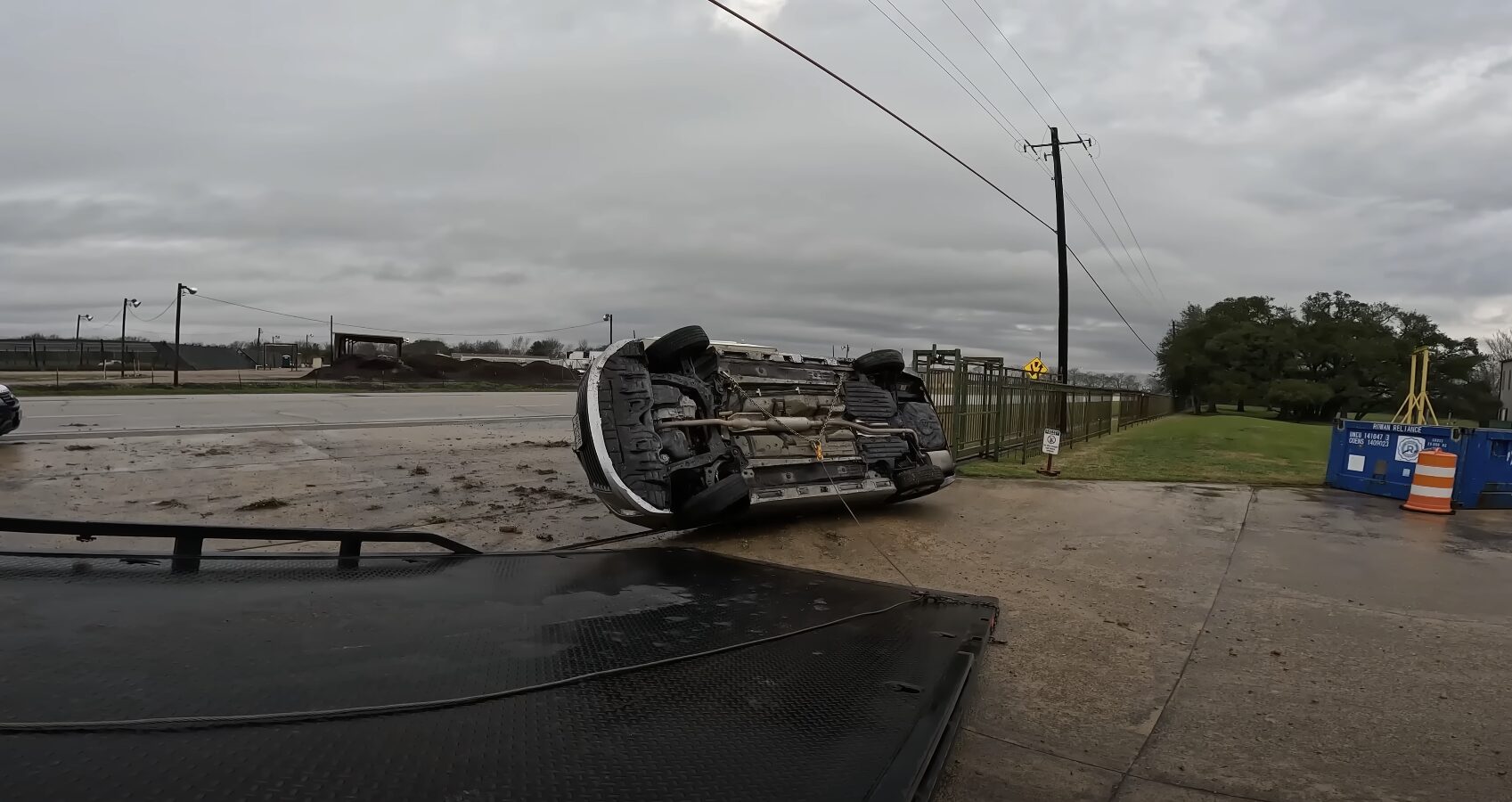 Professional Vehicle Recovery and Accident Towing Overturned vehicle being recovered by professional towing service